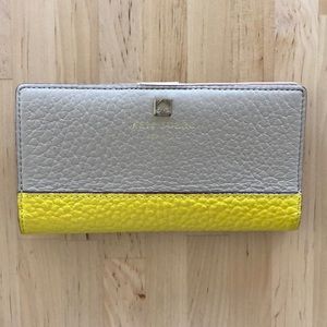 Bright yellow and tan Kate spade wallet